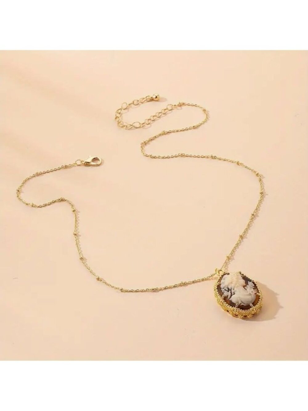 Amber Cameo Pendant Necklace on 16-18" Gold Tone Chain - Picture 2 of 3